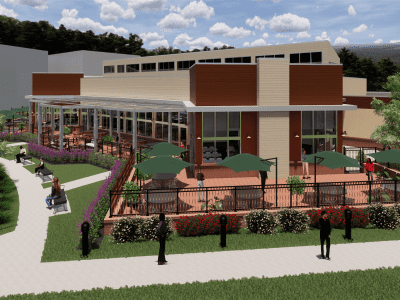 3D rendering of a modern restaurant with large windows, outdoor patio seating, green umbrellas, landscaped paths, and people walking nearby under a partly cloudy sky.