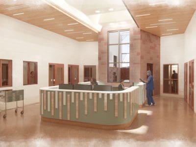 A hospital or clinic reception area with a central desk, two staff members behind it, one nurse with a clipboard, and a patient with a walker approaching the desk.