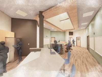 Rendering of a modern office space with wood flooring, skylight, multiple workstations, and people interacting throughout the room.